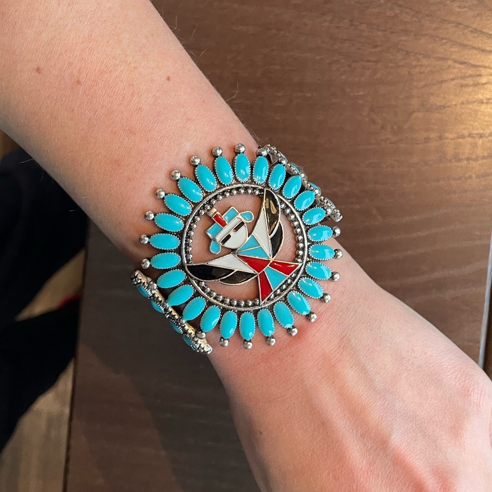 Turquoise with red, black and white stretchy bracelet.